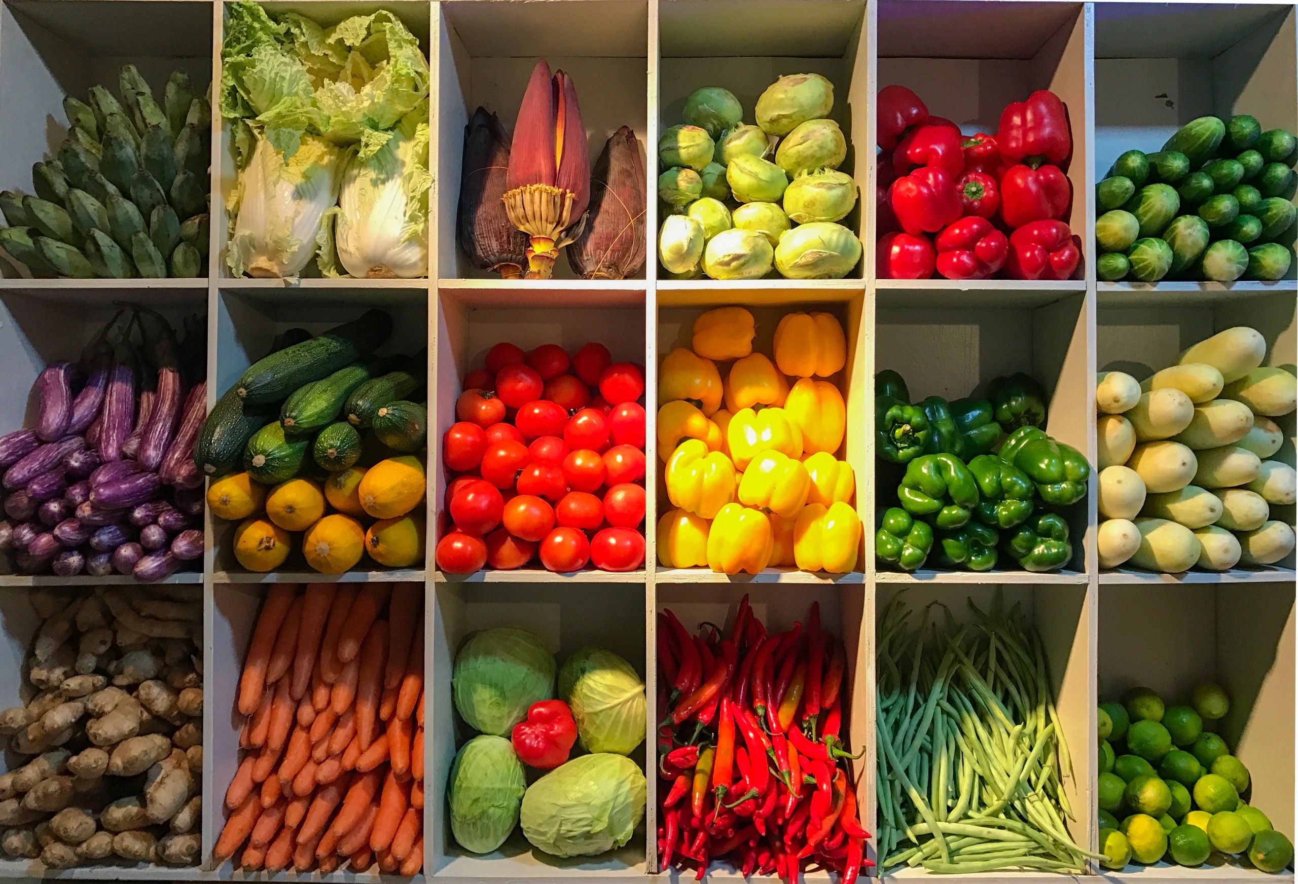 Fresh vegetables stored in crates for export distribution